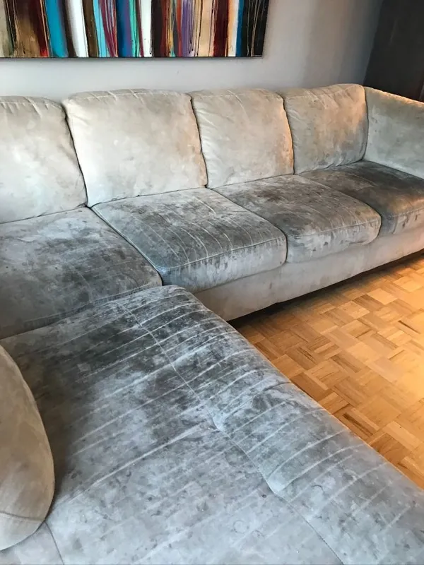 Stained sofa before steam cleaning in Chambly