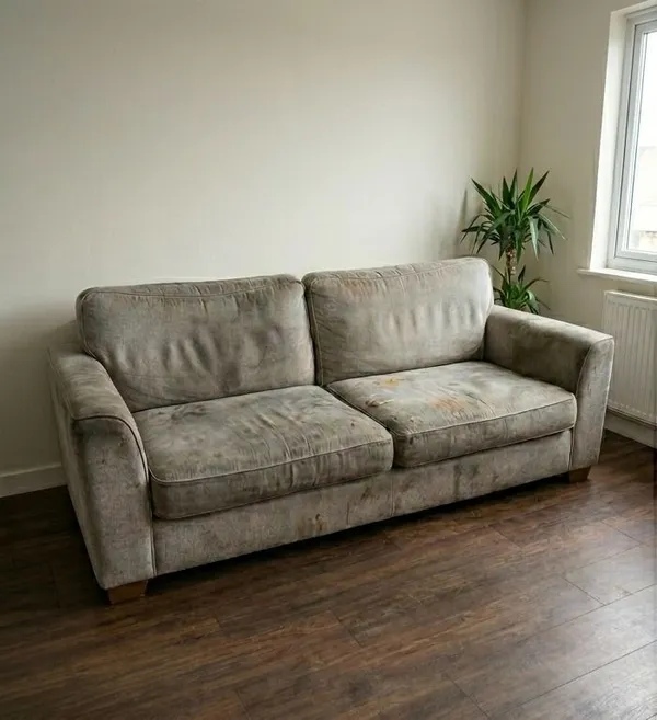Grease stain on sofa fabric before cleaning in Chambly